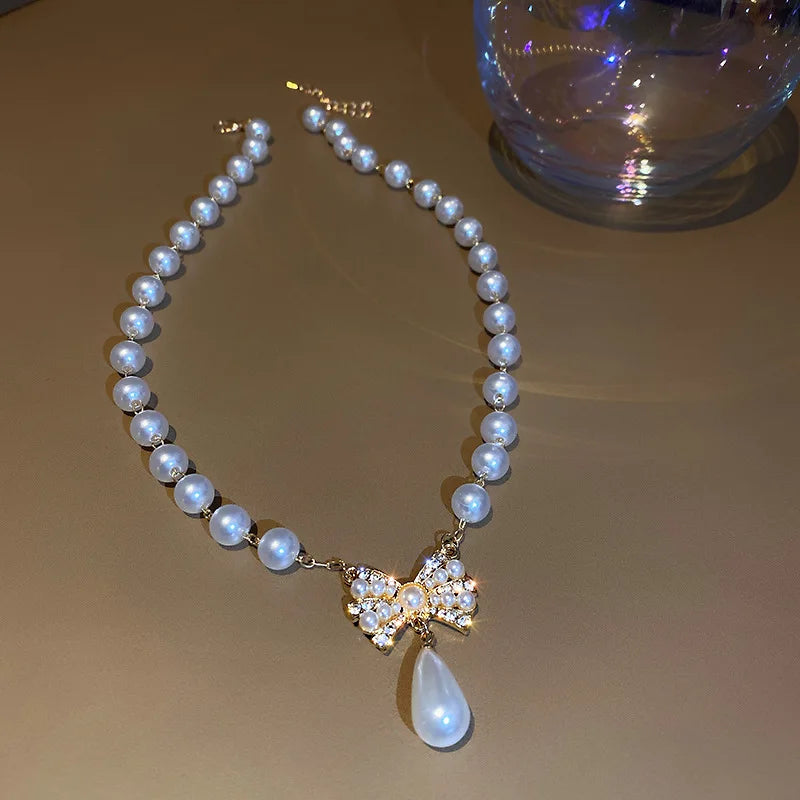 Golden Bow Pearl Drop Necklace